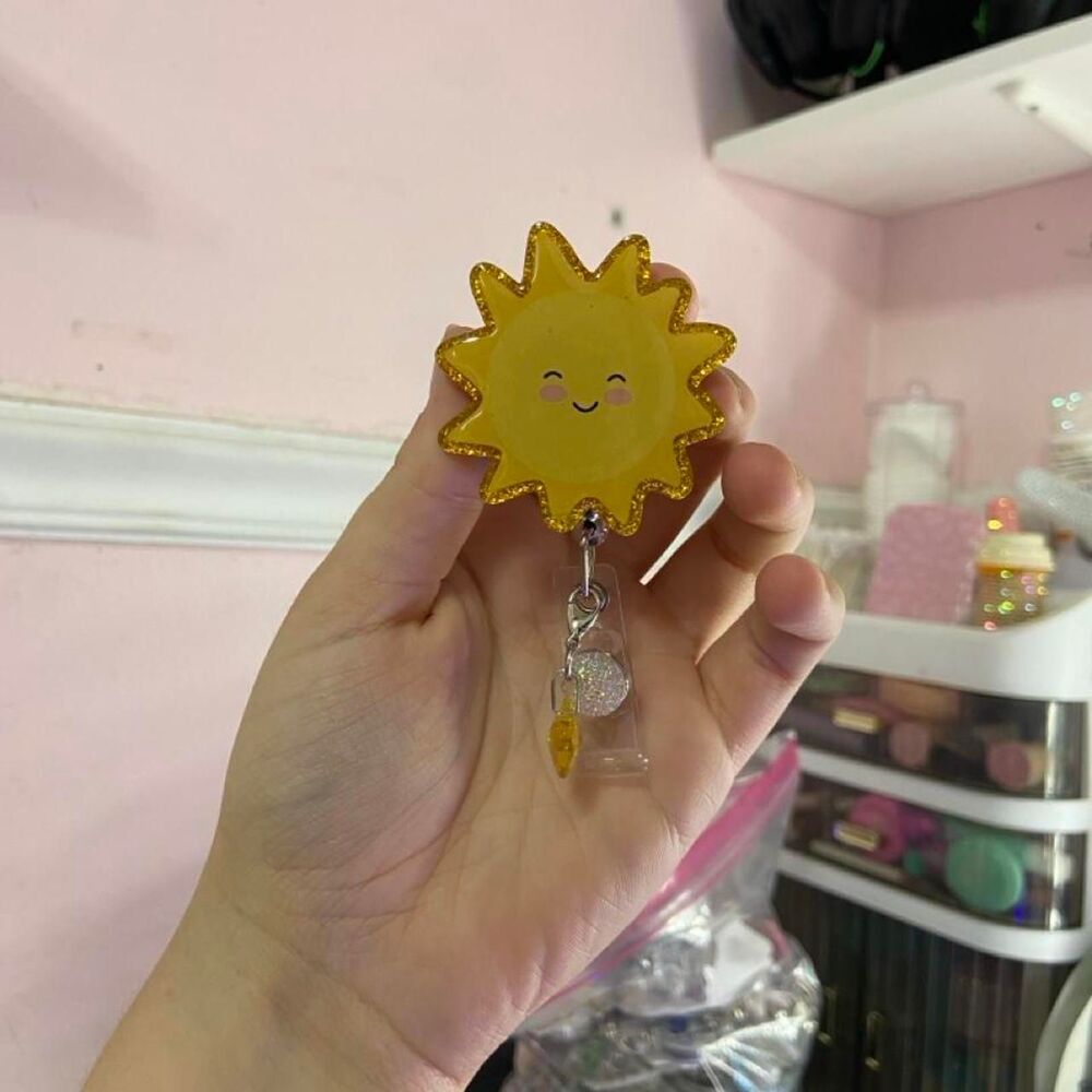 Sun Badge Reel